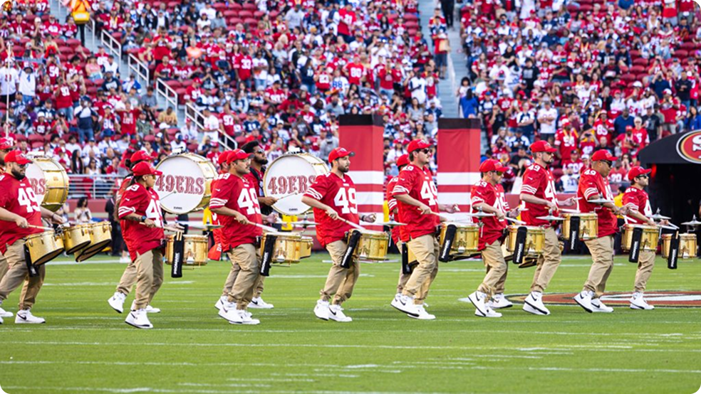 Niner Noise performing on the field at Levi&rsquo;s Stadium