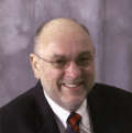 Dr. Tim Lautzenheiser